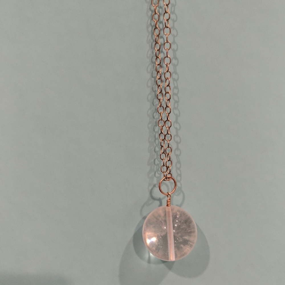 Gold tone chain. Crystal orb approx ,.5 in diamete